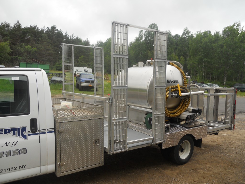 On this truck they opted for manually loading via ramps instead of lift gates.