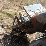 Jeep CJ 8 climbing rock ledge