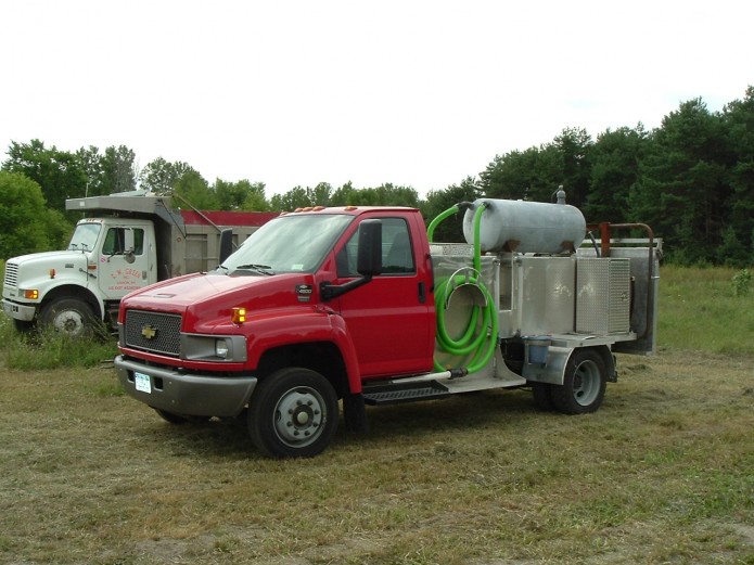 AJ's septic red chevy kodiak portable toilet service truck